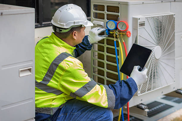 Professional Air Conditioning Repair technician working in Perry, KS